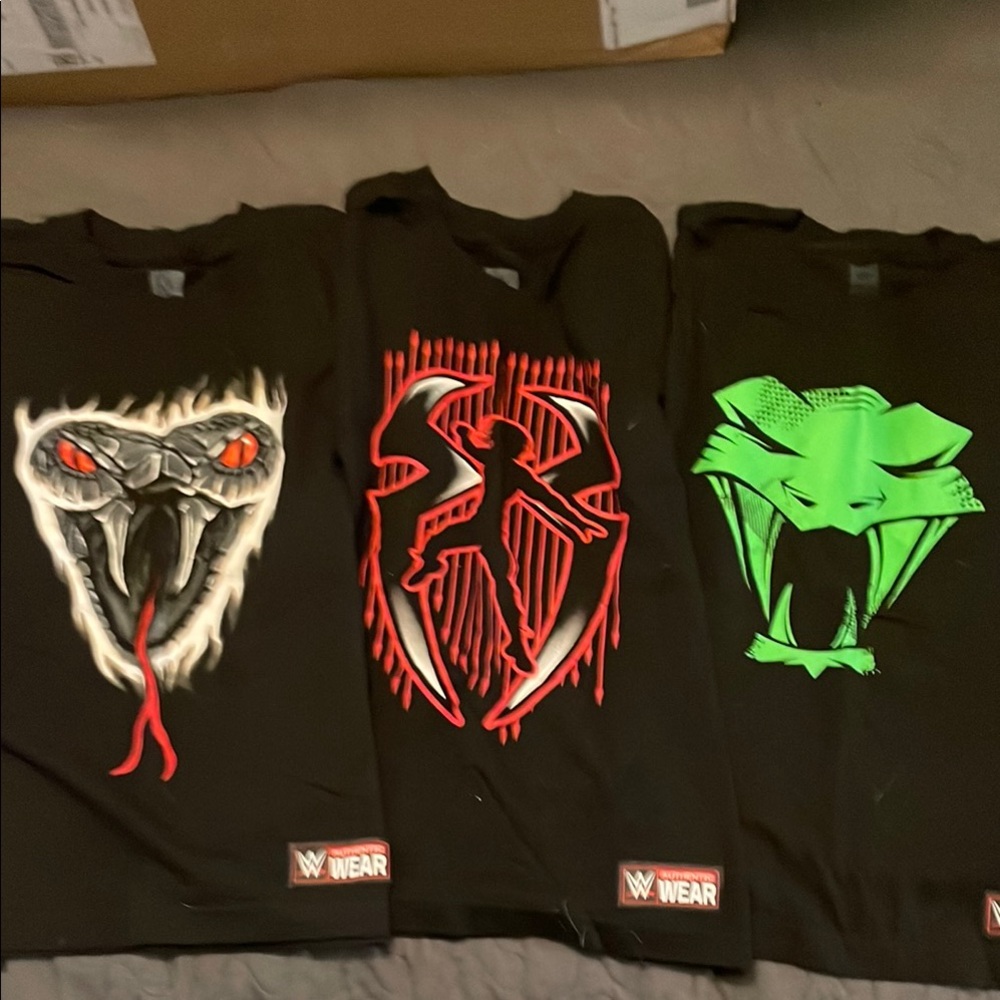 WWE 3 boys medium Black Short Sleeve Tees